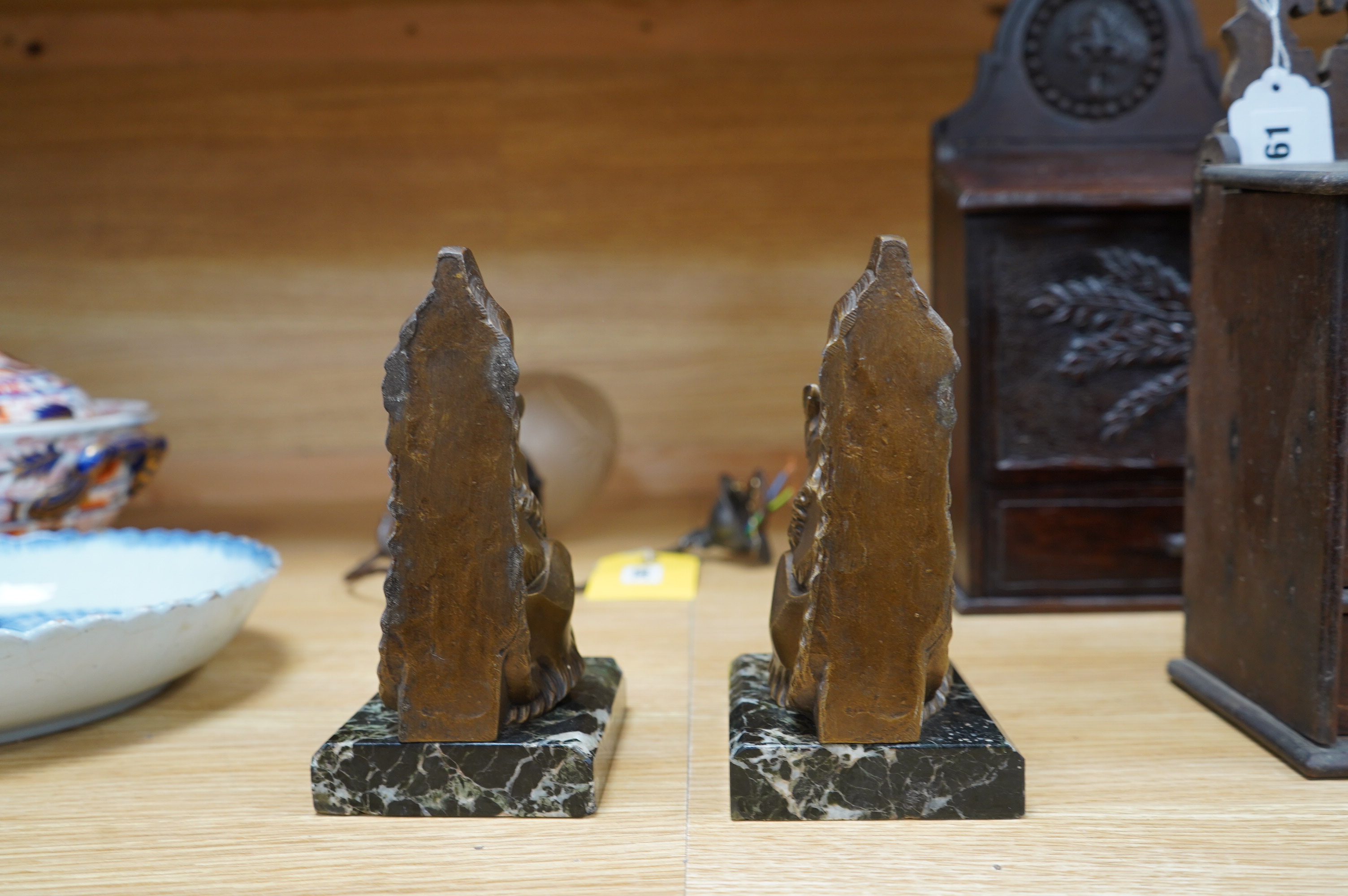 A pair of French Art Deco spelter squirrel bookends, on marble plinths, 18cm high. Condition - fair to good